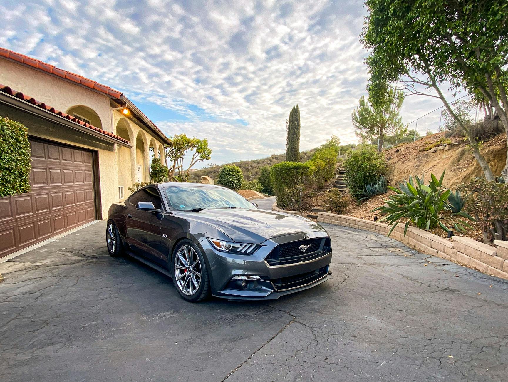 ford mustang near house