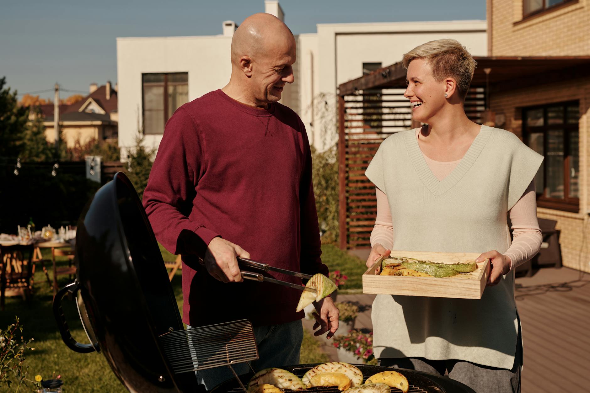 a couple cooking food together